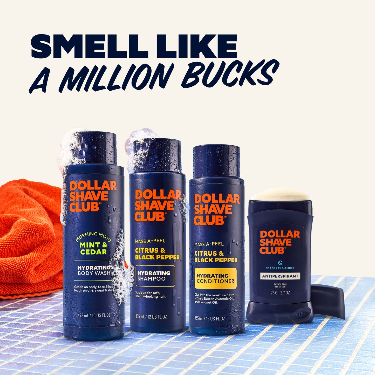 Dollar Shave Club products including body wash, shampoo, conditioner, and antiperspirant on a checkered surface with text 'Smell Like a Million Bucks'.