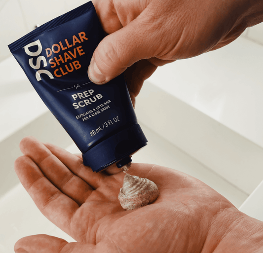 Dollar Shave Club's Prep Scrub being squeezed into a palm.
