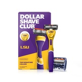 Dollar Shave Club Louisiana State University grooming kit on a white background. Includes a purple razor handle with the LSU Tigers logo, 24 blades, Shave Butter, Prep Scrub, a black 3-in-1 electric trimmer, and a black traveler case.