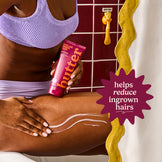 Person applying 'butter' hair removal product to leg with a purple label, against a bathroom background.