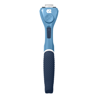Blue grooming tool with UNC logo on a white background