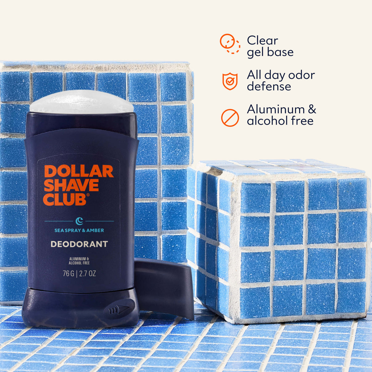 Dollar Shave Club deodorant stick on a tiled surface with product features listed.