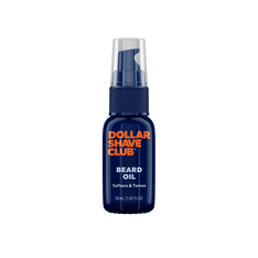 Dollar Shave Club beard oil bottle on a black background