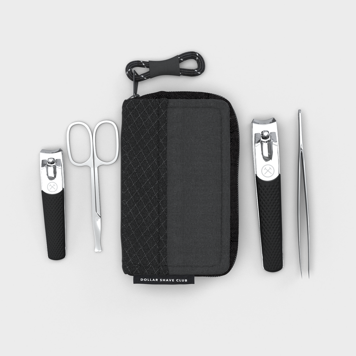 Tool kit items and carry case laid out on white background