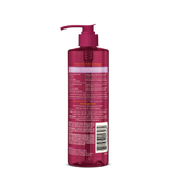 Dollar Shave Club shave oil bottle with pump on a black background, back of bottle