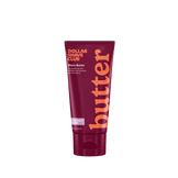 Dollar Shave Club shave butter tube with maroon and orange design on a white background