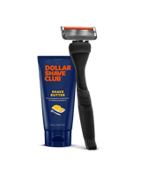 Dollar Shave Club razor and shave butter on a black background