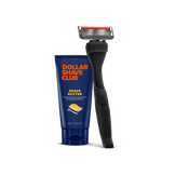 Dollar Shave Club razor and shave butter on a black background