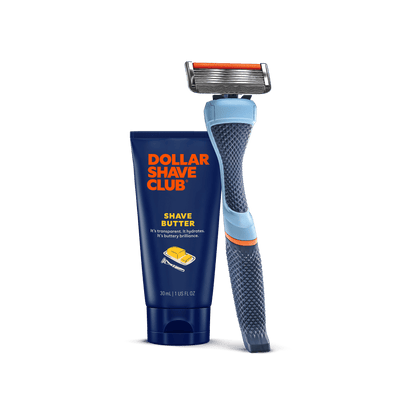 Dollar Shave Club razor and shave butter on a black background