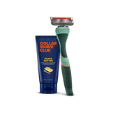 Dollar Shave Club razor and shave butter on a black background