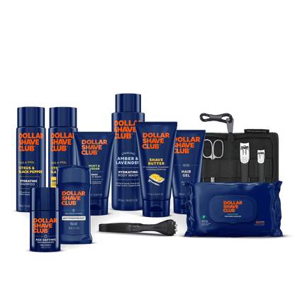 Collection of Dollar Shave Club products including bottles, a pouch, and grooming tools on a black background.