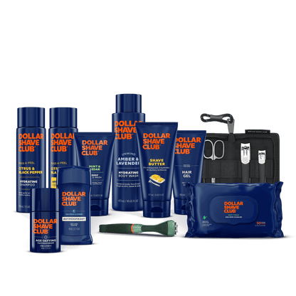 Collection of Dollar Shave Club products including bottles, a pouch, and grooming tools on a black background.