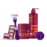 Dollar Shave Club grooming products including a razor, scrub, and shave oil on a black background.