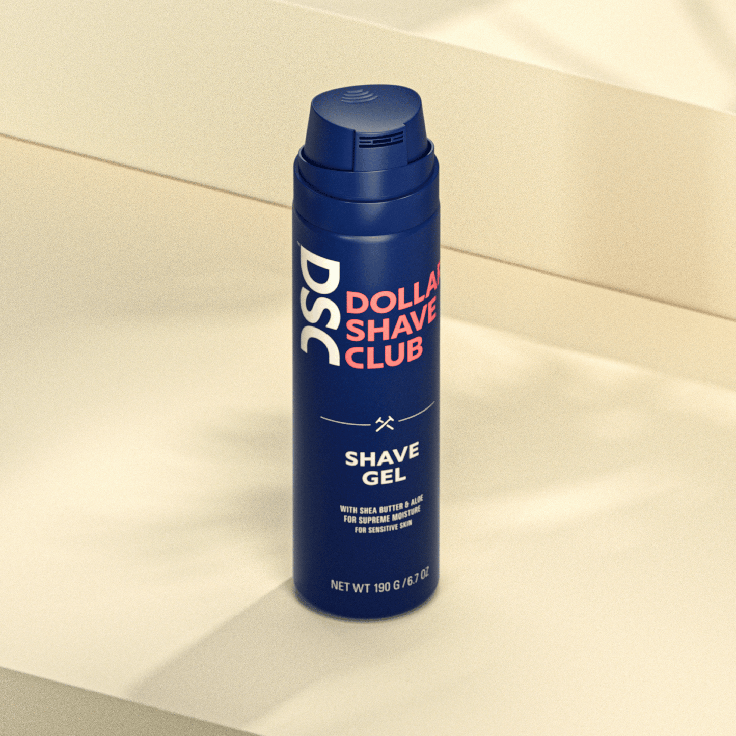 Dollar Shave Club Shave Gel product image against tan backdrop.