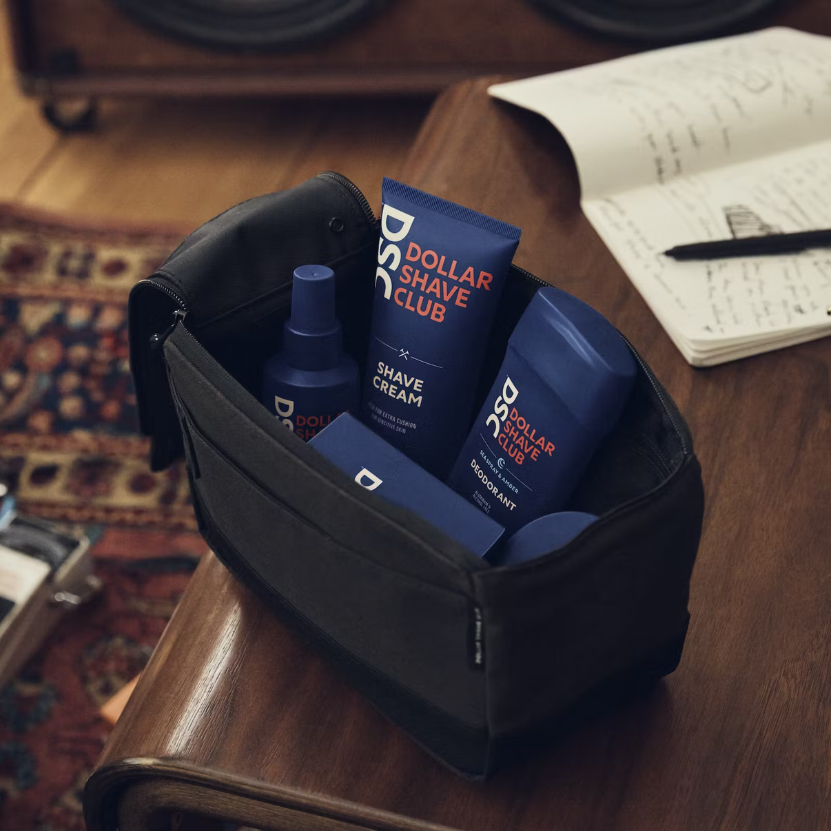 Dollar Shave Club Traveler in use on desk.